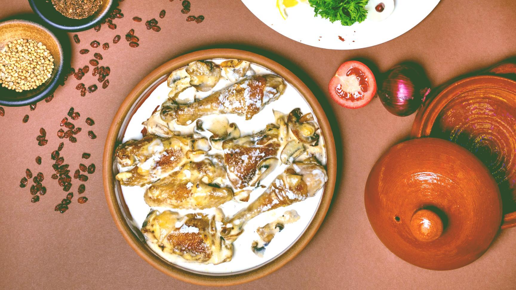 Georgian khinkali dumplings being shaped by hand
